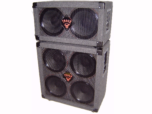 Large backline standard right of stage 2x12" and 4x12" instrument monitor cabs